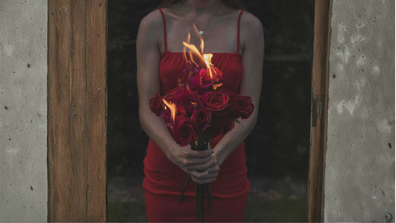 pexels-eli-searcy-edited-woman-in-a-red-dress-holding-a-bouquet-of-burning-roses-19227041